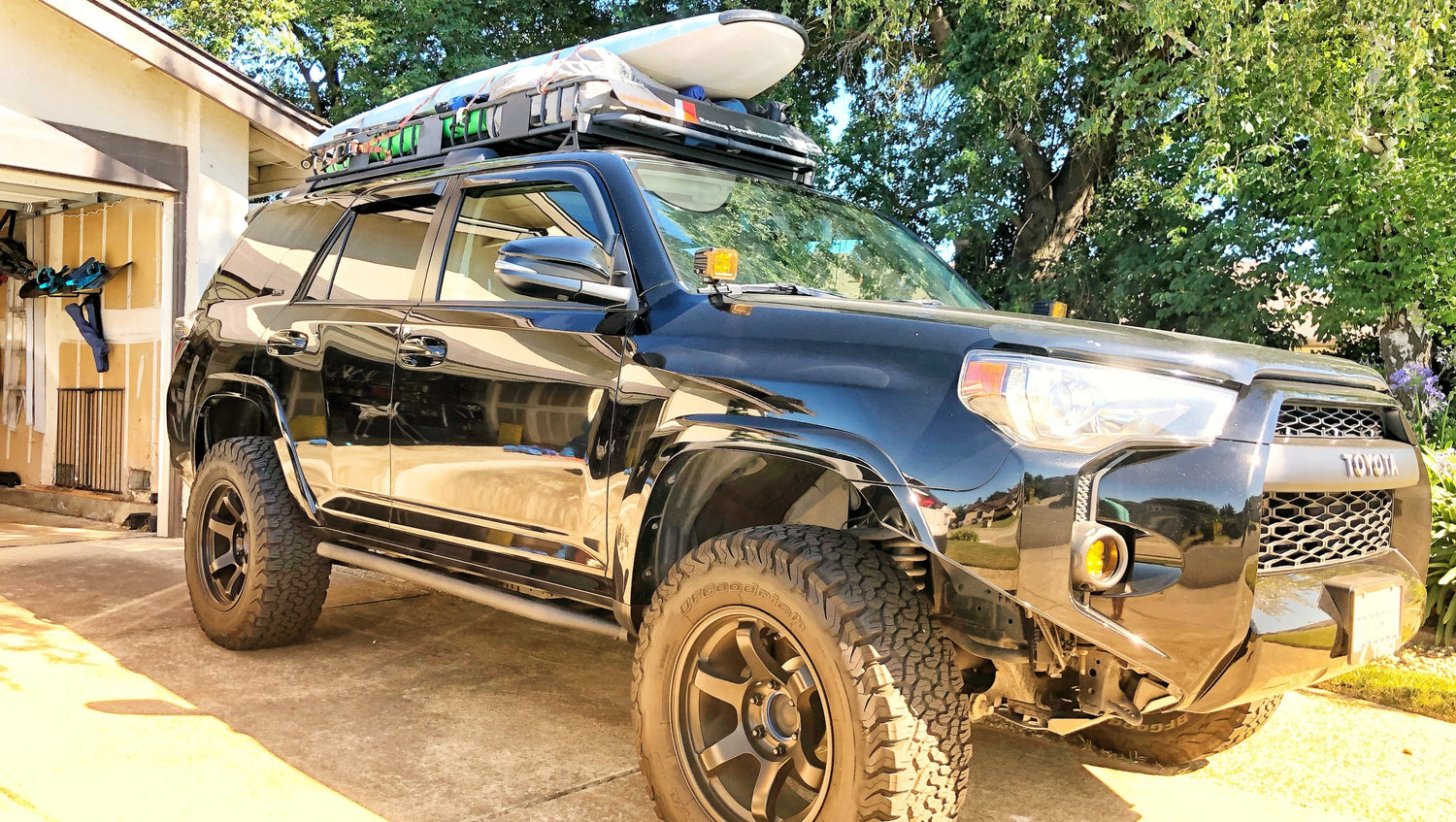 Front passenger side - Trail Edition Bolt On Rock Sliders on black 4Runner - Cali Raised LED