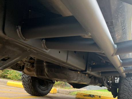 Close up underside view of 4Runner with Trail Edition bolt on rock sliders - Cali Raised LED