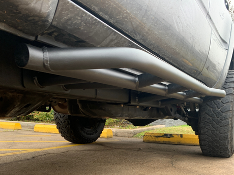 Close up underside view of 4Runner with Trail Edition bolt on rock sliders - Cali Raised LED